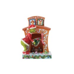 Grinch Pushing Christmas Tree up Fireplace Figurine The Grinch by Jim Shore