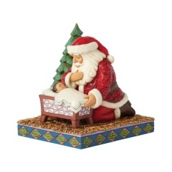 Christmas Miracle Santa Kneeling Over Baby Jesus