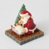 Christmas Miracle Santa Kneeling Over Baby Jesus